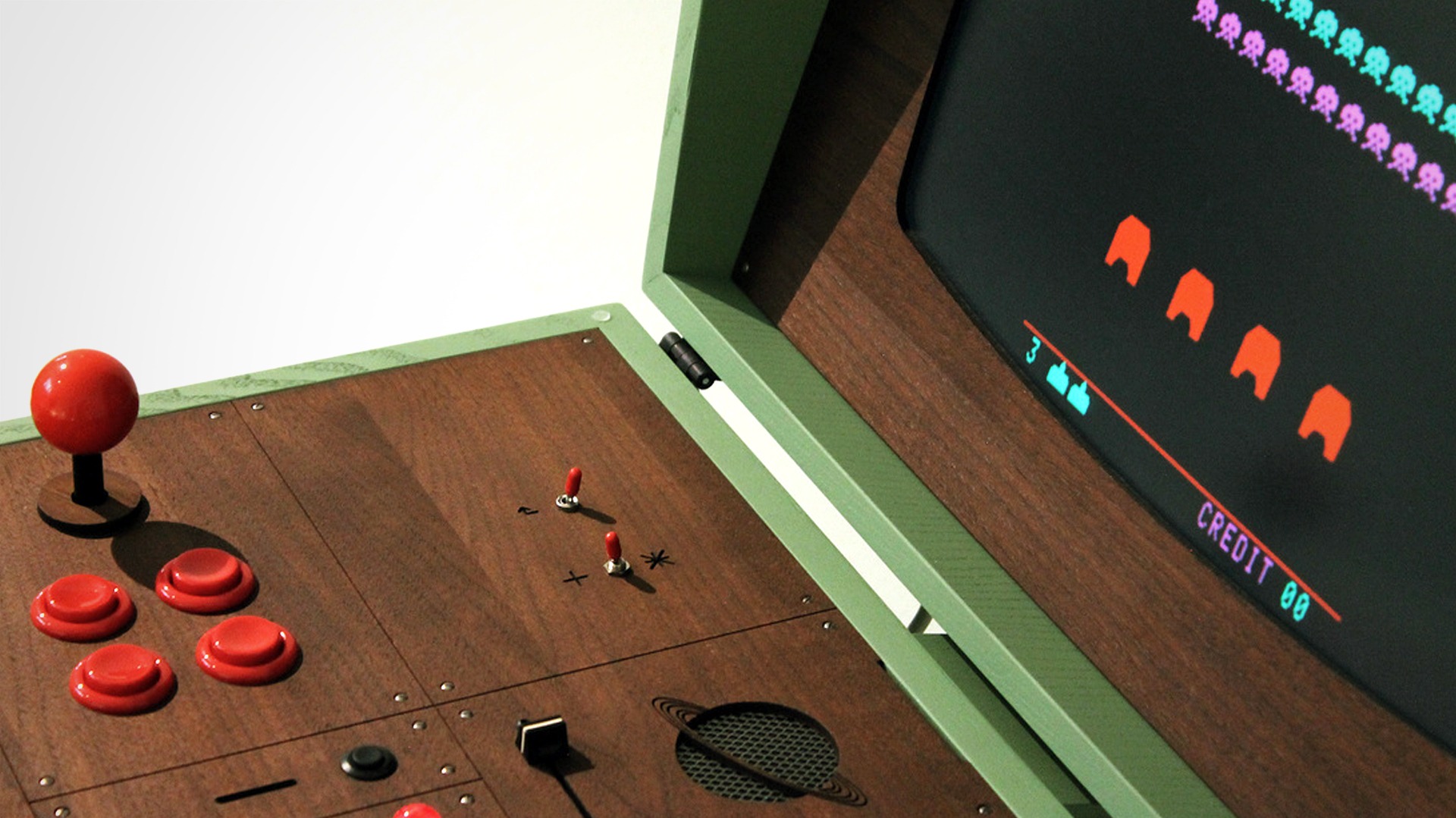 These Handmade Wood Retro Arcade Cabinets Are Inspired by the Earliest Space Travels