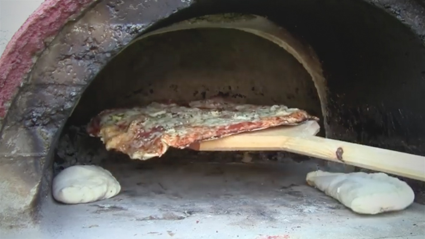This Wood Fired Pizza Oven Was Made Using a Pilates Ball SolidSmack