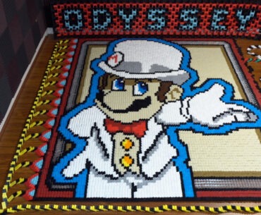 Watch a Mesmerizing 148,777-Piece Super Mario Domino Mural Collapse