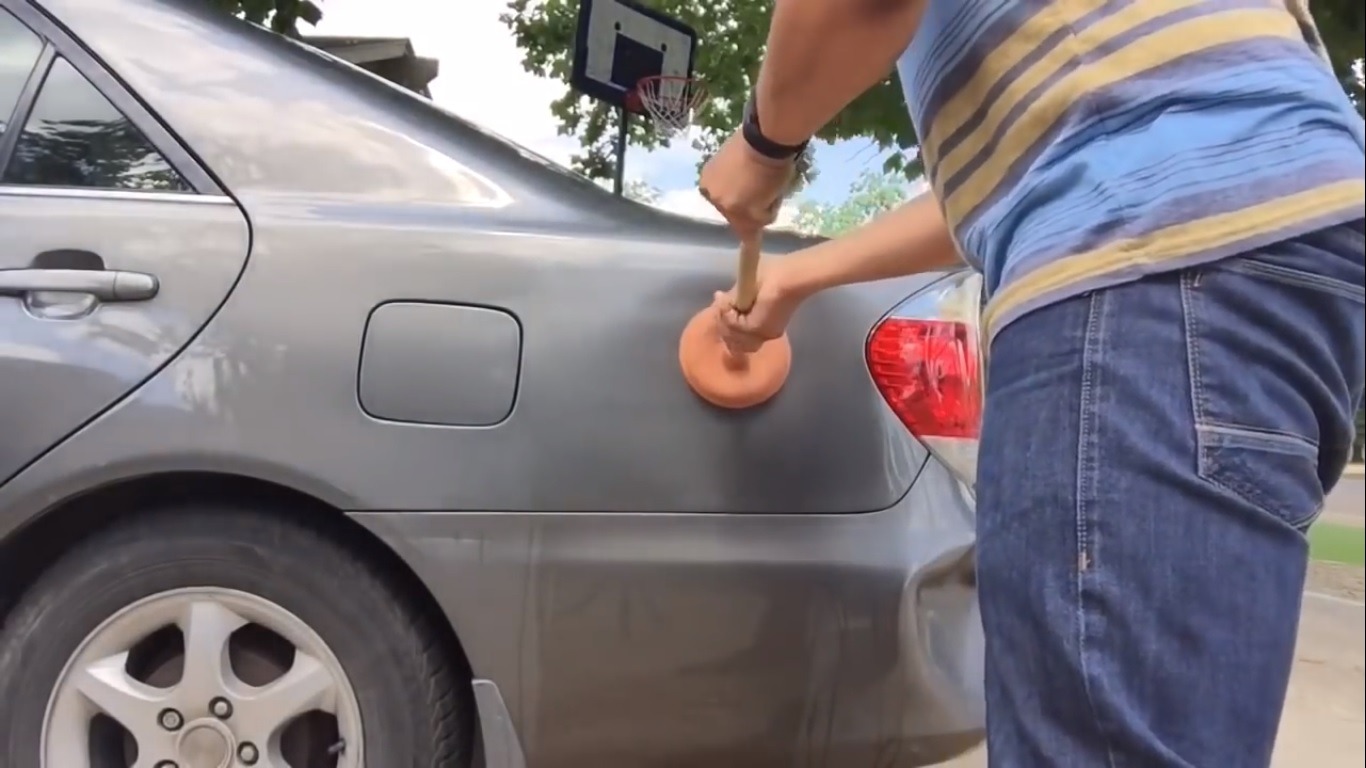 How To Fix A Small Dent In A Car With A Plunger