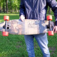 newspaper skateboard