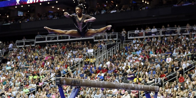 The Biomechanical Perfection of Simone Biles in Flight