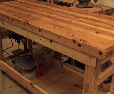Make Your Own Wooden Table Using 2x4s And Dowels for Under $100 dowel table