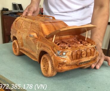 A Toyota Land Cruiser Prado Carved From a Single Chunk of Wood land cruiser wood carving