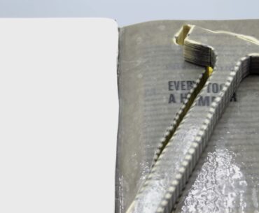 Someone Actually Turned Adam Savage’s Book Into A Working Hammer book hammer