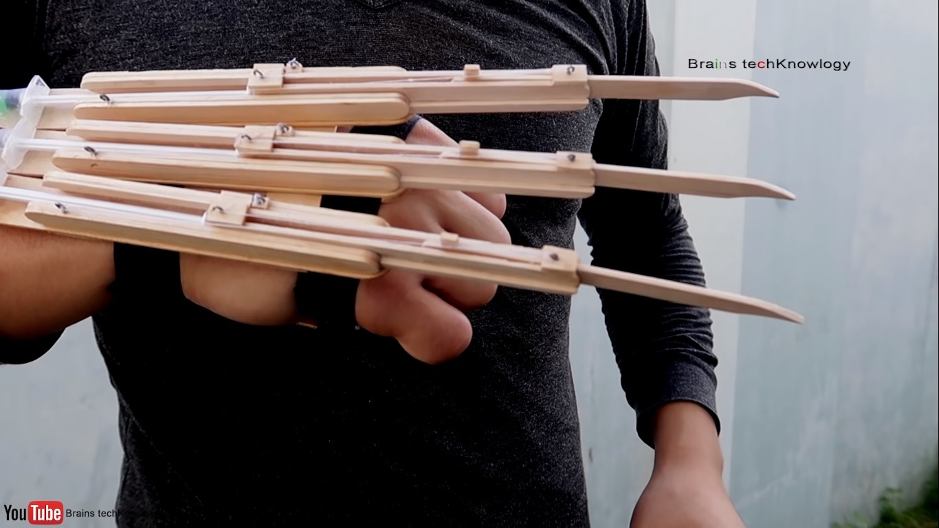 Make Your Own Retractable Wolverine Claws With Popsicle Sticks and Pressurized Syringes wooden Wolverine claws