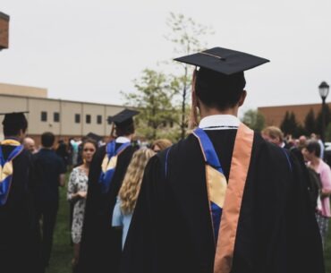 9 Things You Should Take Care of While in College man wearing academic gown