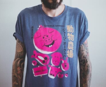 How Custom Tshirt Printing Can Benefit You to Escalate Your Business man wearing blue and pink angry bird-printed t-shirt