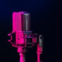 pink and silver condenser microphone