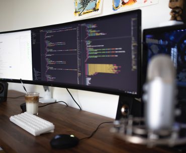 Why choose Node Js for your next web app project? turned-on flat screen monitor