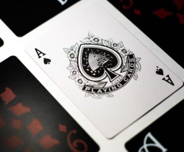 spade playing card on white surface