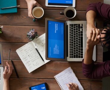 Top View Photo of People Having a Meeting