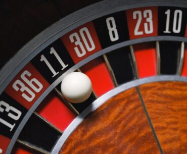 Close-up of a Ball Landing on Number 11 Black in Roulette