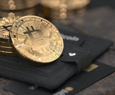 Is Bitcoin Widely Used in Ghana? silver round coin on black leather case