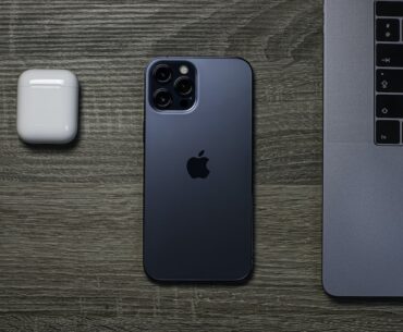 Building a Better Tomorrow: How Apple is Leading the Charge on Sustainable Manufacturing and Environmental Responsibility silver iphone 6 beside white apple airpods