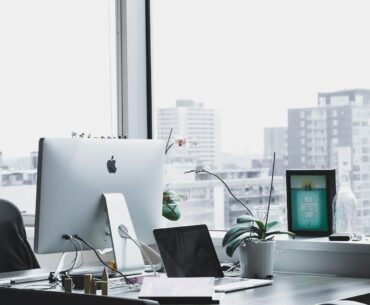 Essential Steps to Launching Your Real Estate Business closeup photo of silver iMac