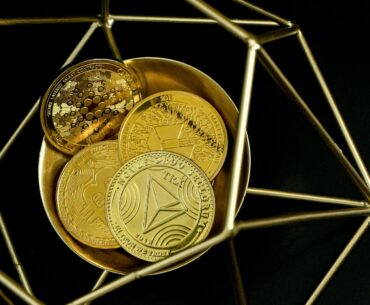 The Competitive Landscape: Cosmos vs. Other Layer-1 Blockchains a close up of a plate of coins