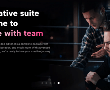 A person and person looking at a computer Description automatically generated