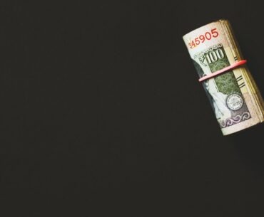 What You Need to Do in Order to Run a Successful Online Casino a roll of money wrapped in a red ribbon