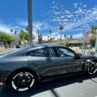 black sedan on road during daytime