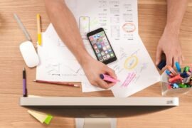 Integrating Qualitative and Quantitative Research: Best Practices person writing on white paper