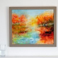 a painting hanging on a wall above a fireplace