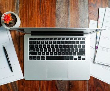 Smart Strategies for IT Certification Success Using Online Practice Resources a laptop computer sitting on top of a wooden desk