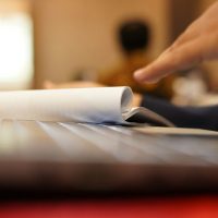 a close-up of a person reading a book