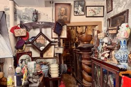 Cluttered antique shop filled with various items