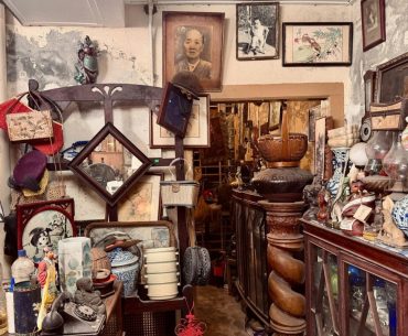Designing Everyday Objects People Actually Keep Cluttered antique shop filled with various items
