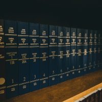 blue locker on brown wooden shelf