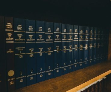 Best Law Firms in Charleston, SC for a Wide Range of Legal Services blue locker on brown wooden shelf