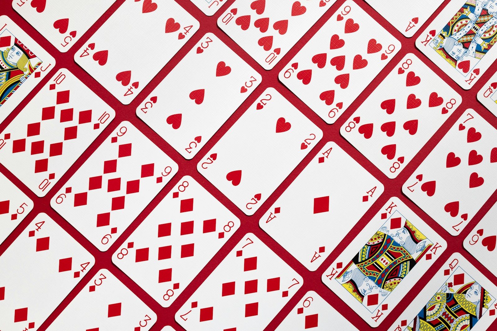 Solitaire.net: Mastering the Classic Card Game Online A close up of a red and white table cloth