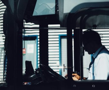 The Operator Cab Gets a Second Look: How Human Factors Engineering Is Rewriting the Machine Around the Person silhouette photography of man driving bus