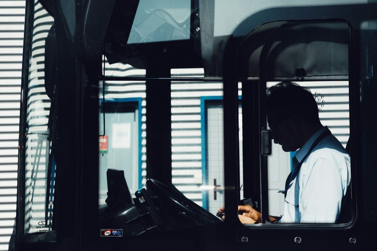 The Operator Cab Gets a Second Look: How Human Factors Engineering Is Rewriting the Machine Around the Person silhouette photography of man driving bus