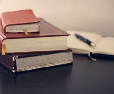 5 Best Law Firms Making a Difference in Puyallup, WA selective focus photography of three books beside opened notebook