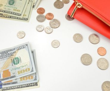 Tracking Your Spending to Spot Patterns 10 us dollar bill and coins