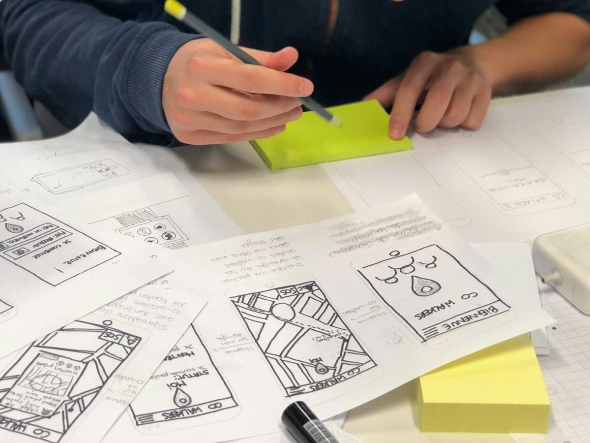 Connected products at scale: why the platform layer becomes your biggest engineering asset — or liability person writing on white paper