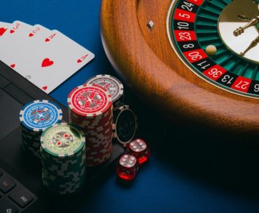 Cly88 or Cyl88? Avoiding Confusion Between Similar Brand Names A roulette wheel, poker chips, playing cards, and dice on a laptop keyboard